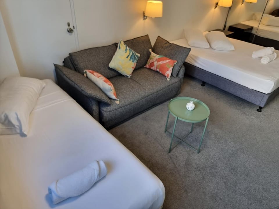 Bed, Seating area, towels