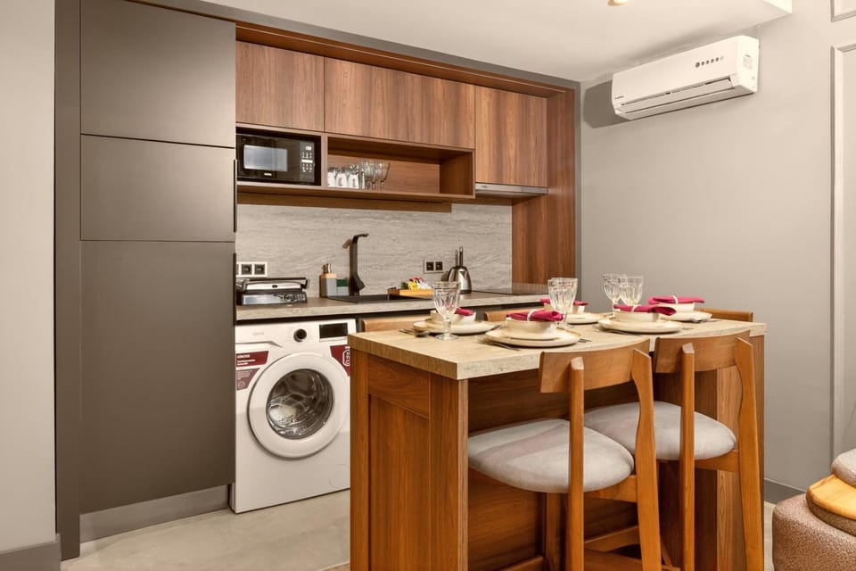 Kitchen or kitchenette, Dining area, dishwasher, washing machine, air conditioner