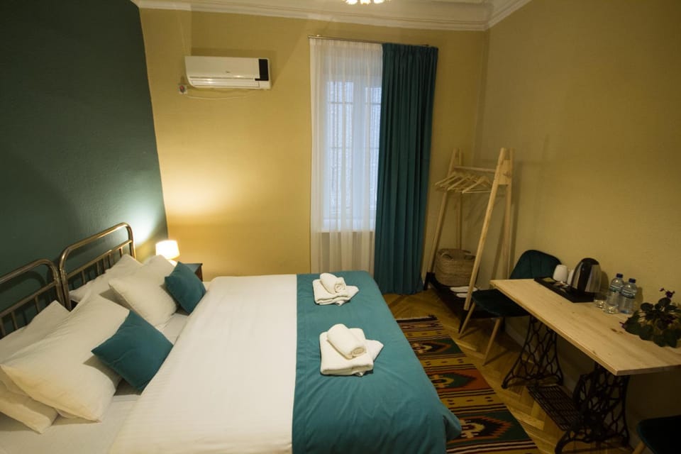 Bed, Photo of the whole room, Bedroom, towels, air conditioner