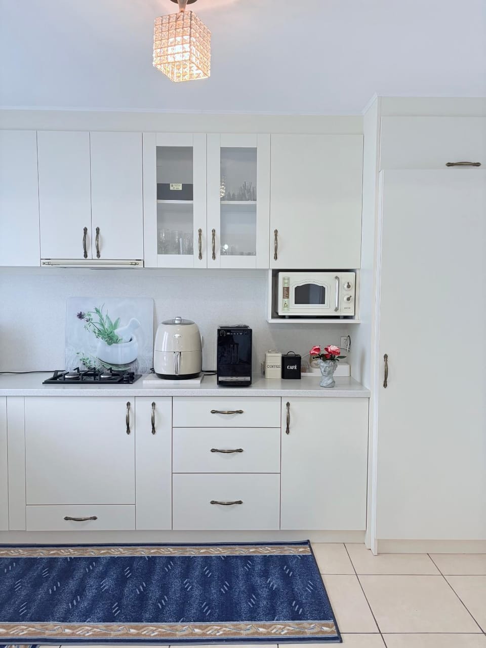 Kitchen or kitchenette, oven, stove, toaster