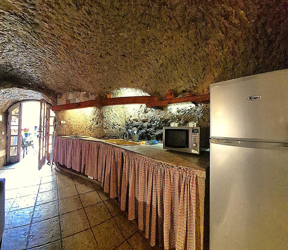 Kitchen or kitchenette, microwave, stove