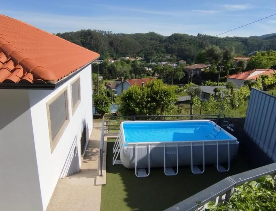 Property building, Day, Pool view, Swimming pool