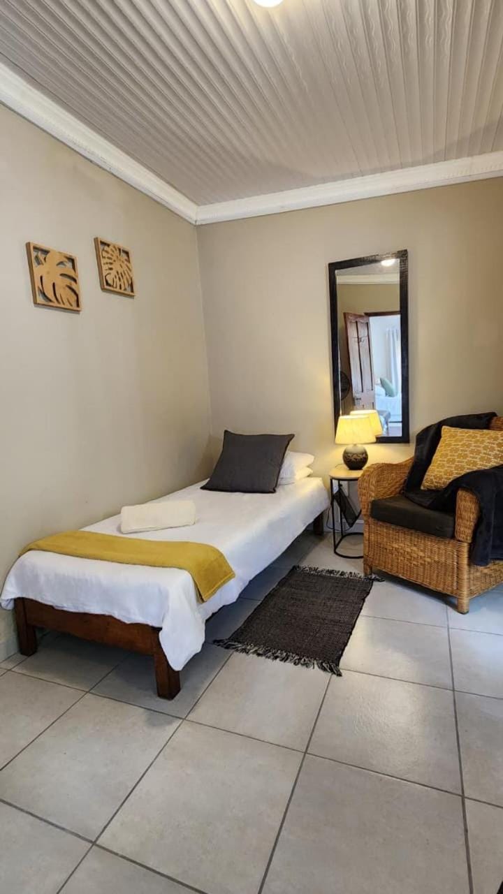 Bed, Seating area, Bedroom