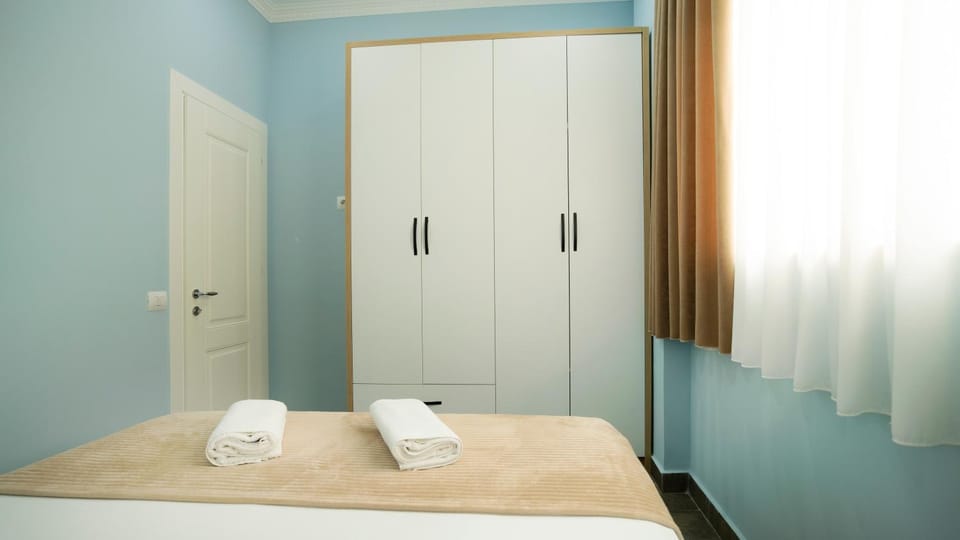 Bed, Photo of the whole room, Bedroom, towels, wardrobe