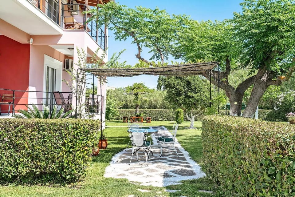 Property building, Patio, Day, Natural landscape, Garden, View (from property/room), Balcony/Terrace, Dining area, Garden view