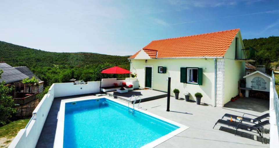 Property building, Patio, Natural landscape, Mountain view, Pool view, Swimming pool