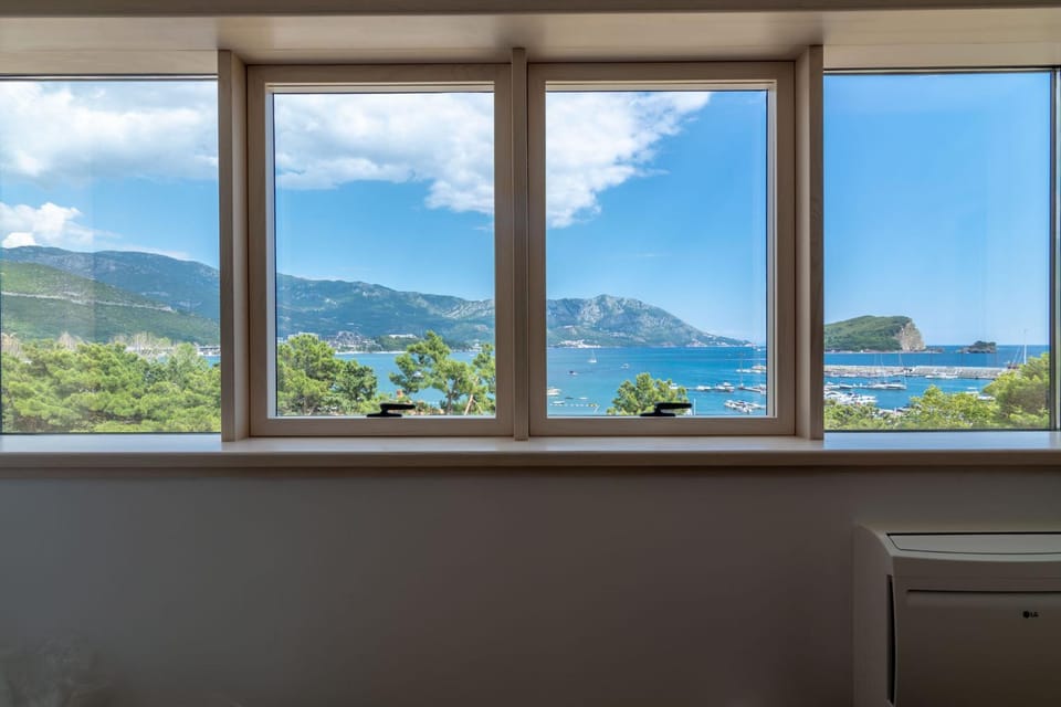 Living room, Seating area, Landmark view, Mountain view, Sea view