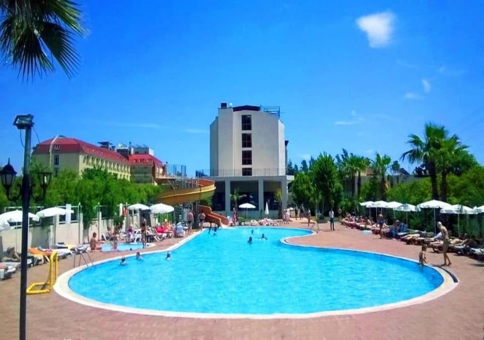 Property building, Day, Pool view, Location, sunbed