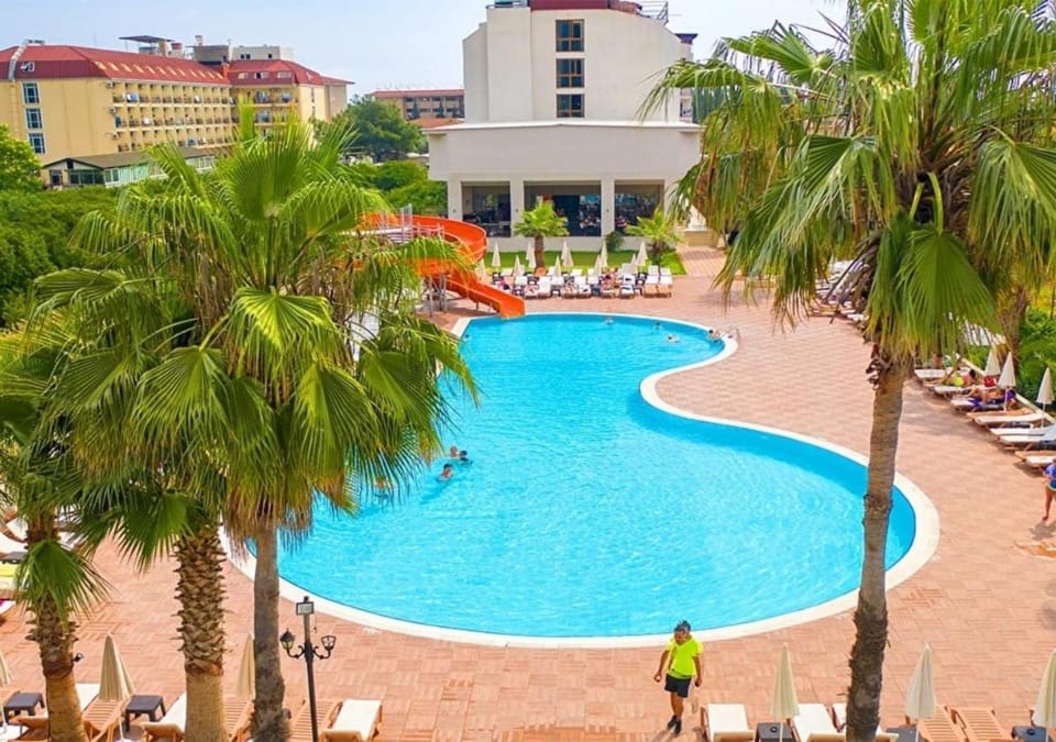 Property building, Pool view, Swimming pool, sunbed