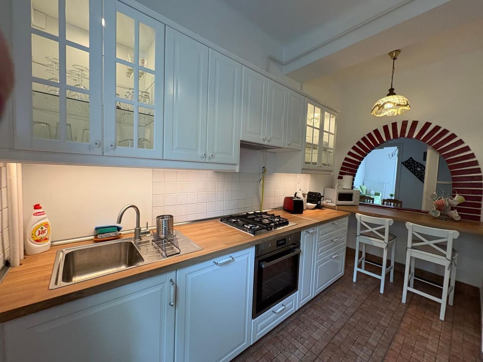 Kitchen or kitchenette, stove, toaster