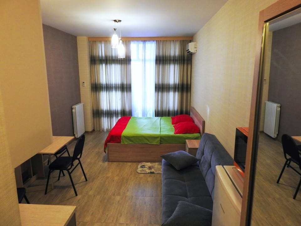 Bed, Living room, Photo of the whole room, Seating area, Bedroom