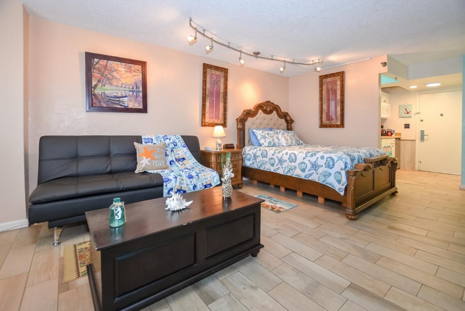 Bed, Living room, Seating area, Bedroom