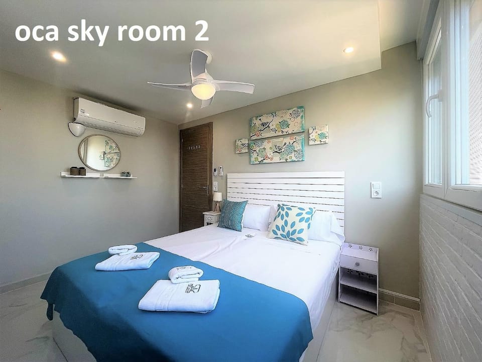 Bed, Photo of the whole room, Bedroom, fireplace, towels, air conditioner