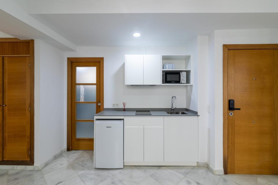 Kitchen or kitchenette, stove, kitchen