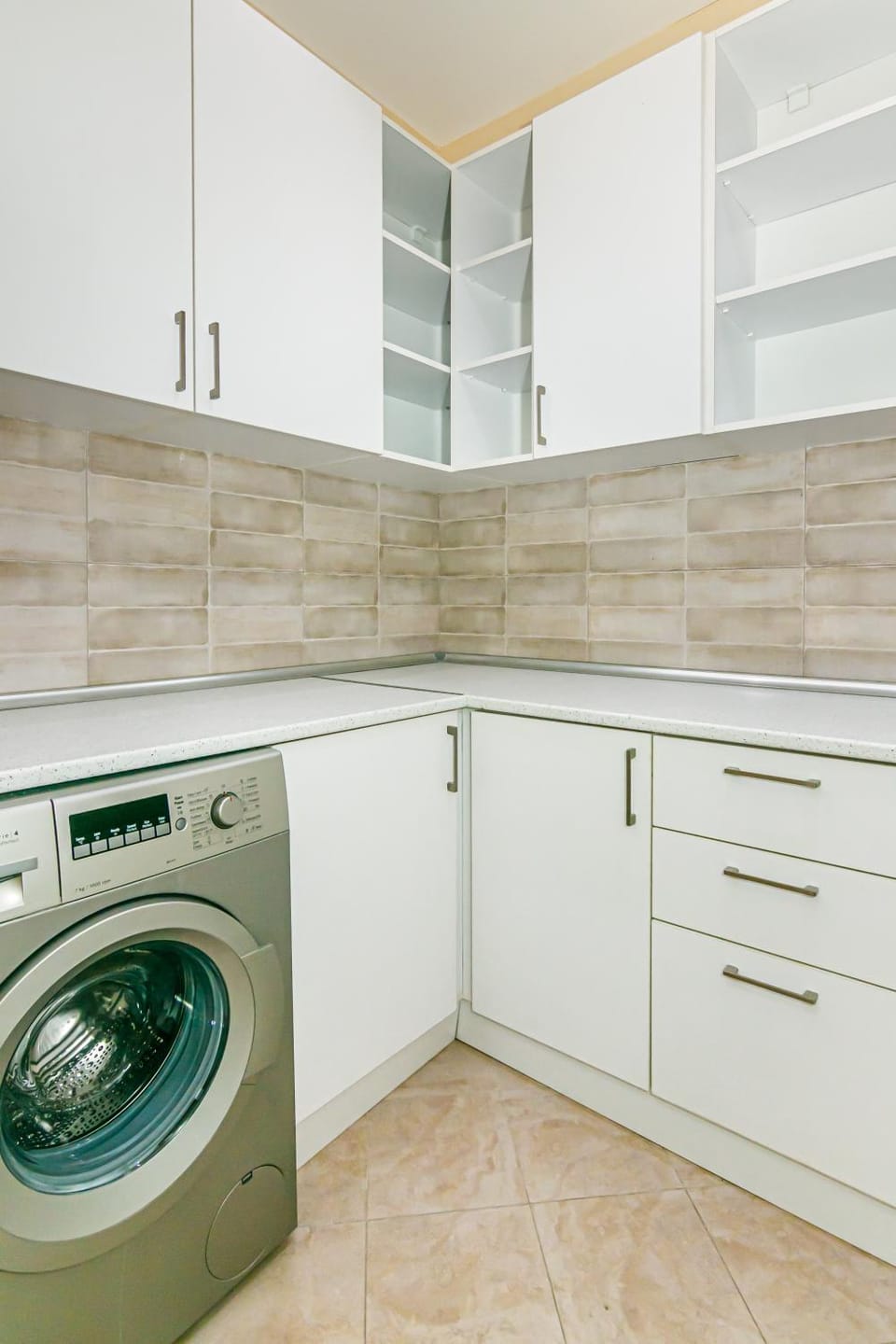 Kitchen or kitchenette, dishwasher, washing machine, dryer