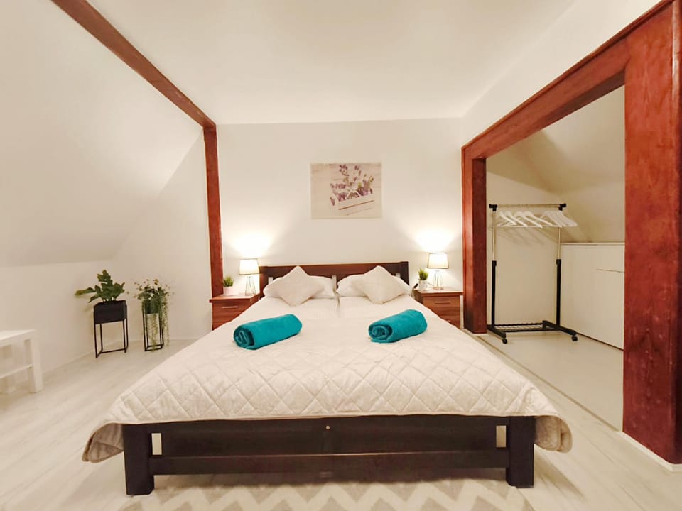 Bed, Natural landscape, Living room, Other, Other, Photo of the whole room, Decorative detail, Decorative detail, Seating area, Bedroom, furniture, furniture, heating, heating, towels, towels, wardrobe