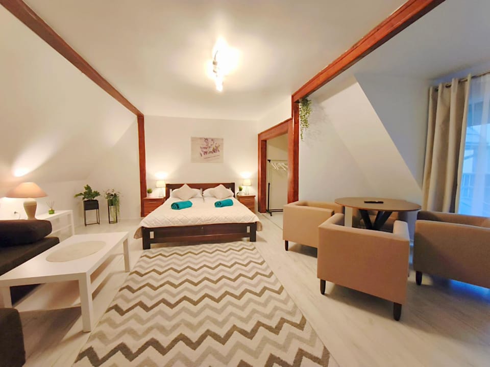 Bed, Natural landscape, Living room, Other, Other, Photo of the whole room, Decorative detail, Decorative detail, Seating area, Bedroom, Text overlay, furniture, furniture, towels, towels