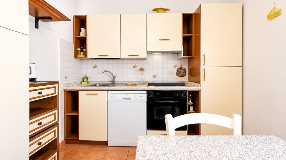 Dining area, dishwasher, oven, stove
