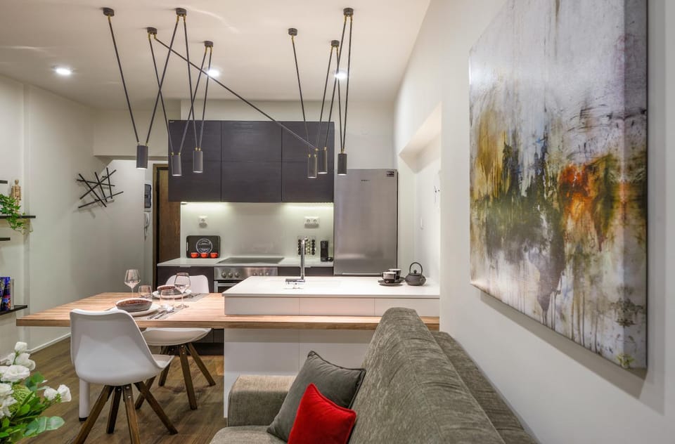 Kitchen or kitchenette, Living room, Seating area, Dining area