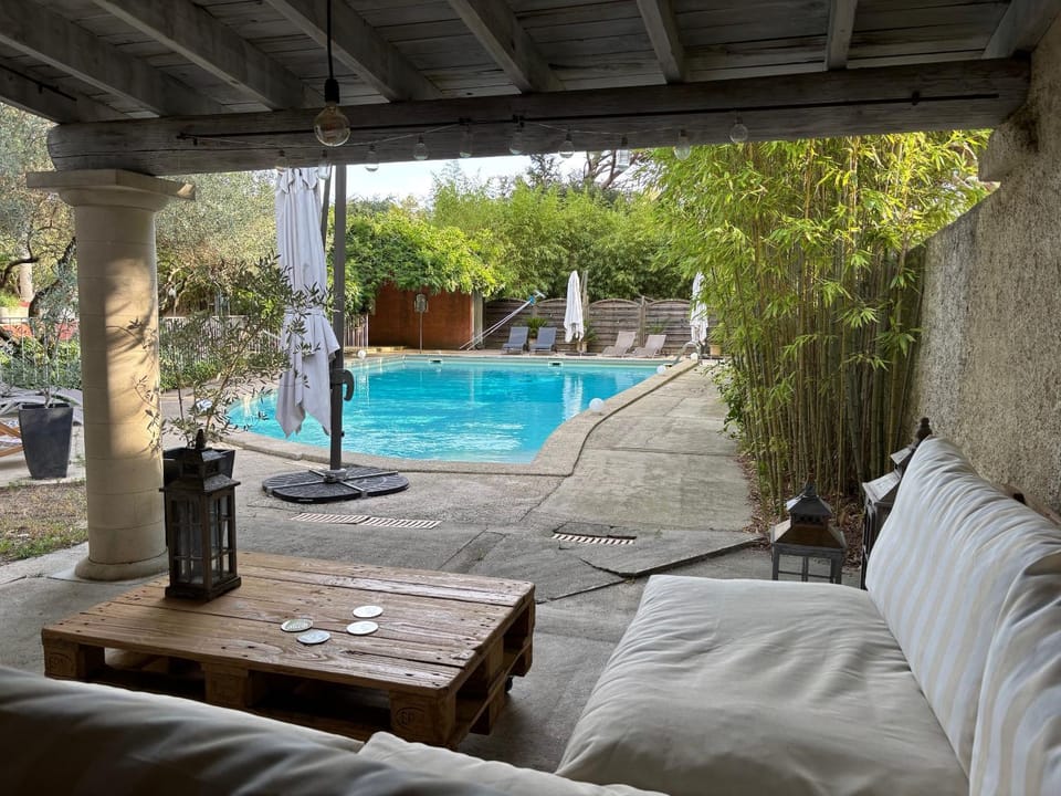 Patio, Natural landscape, Garden, Pool view, Swimming pool, sunbed