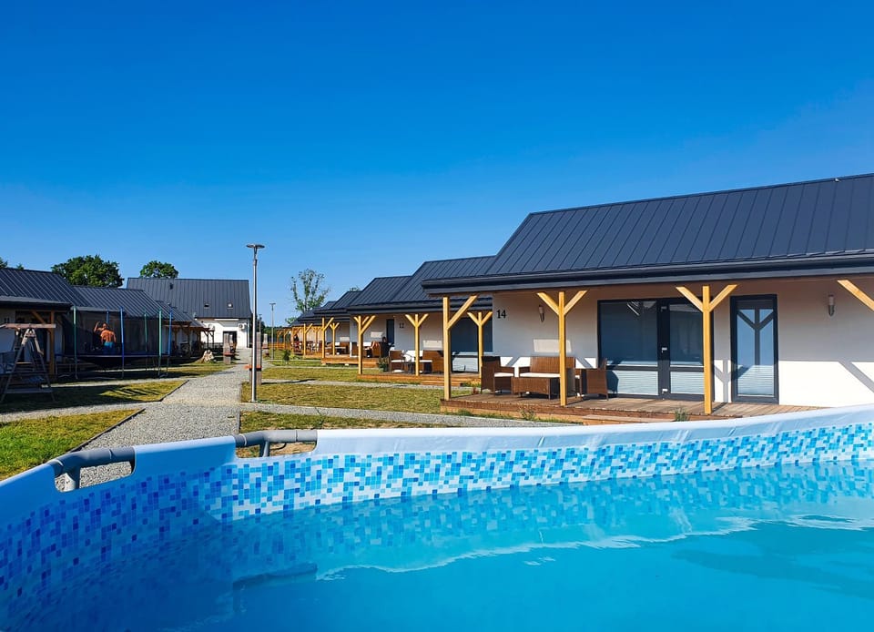 Property building, Patio, Day, Pool view, Swimming pool