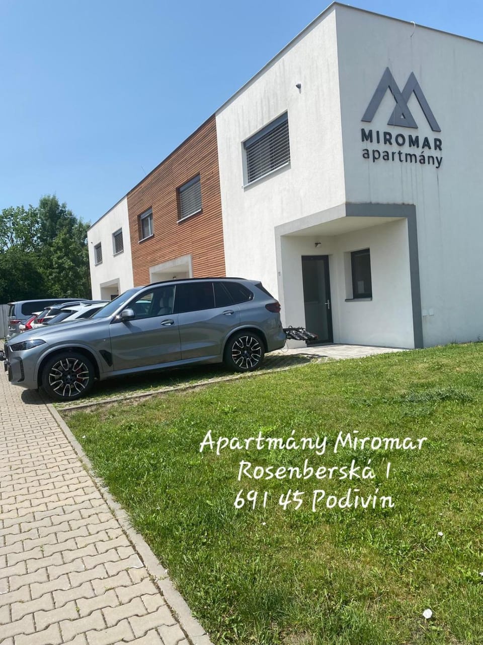 Property building, Text overlay, Parking