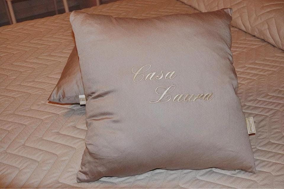 Bed, Property logo or sign, Decorative detail, Bedroom