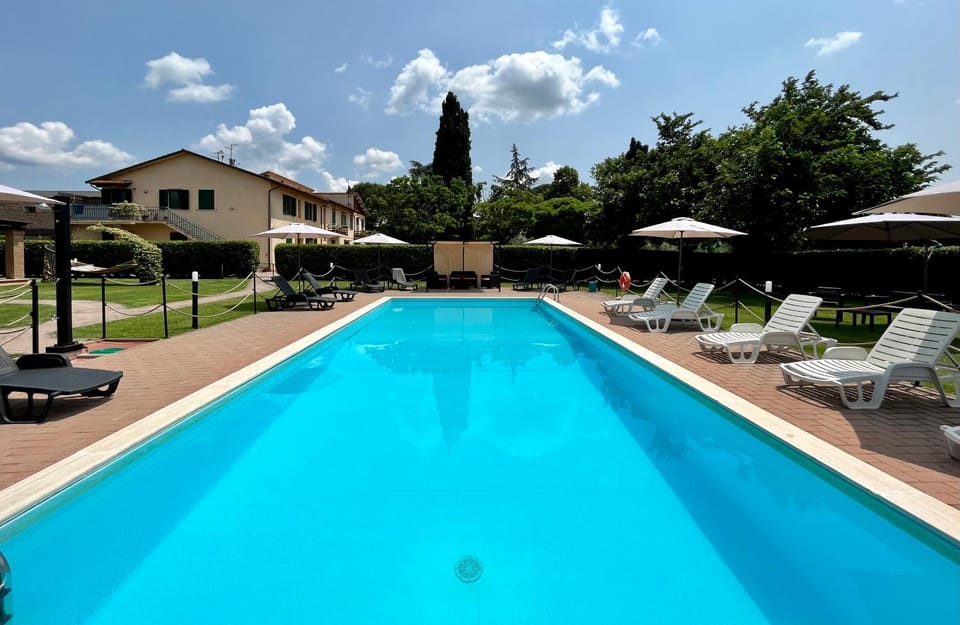 Swimming pool, sunbed