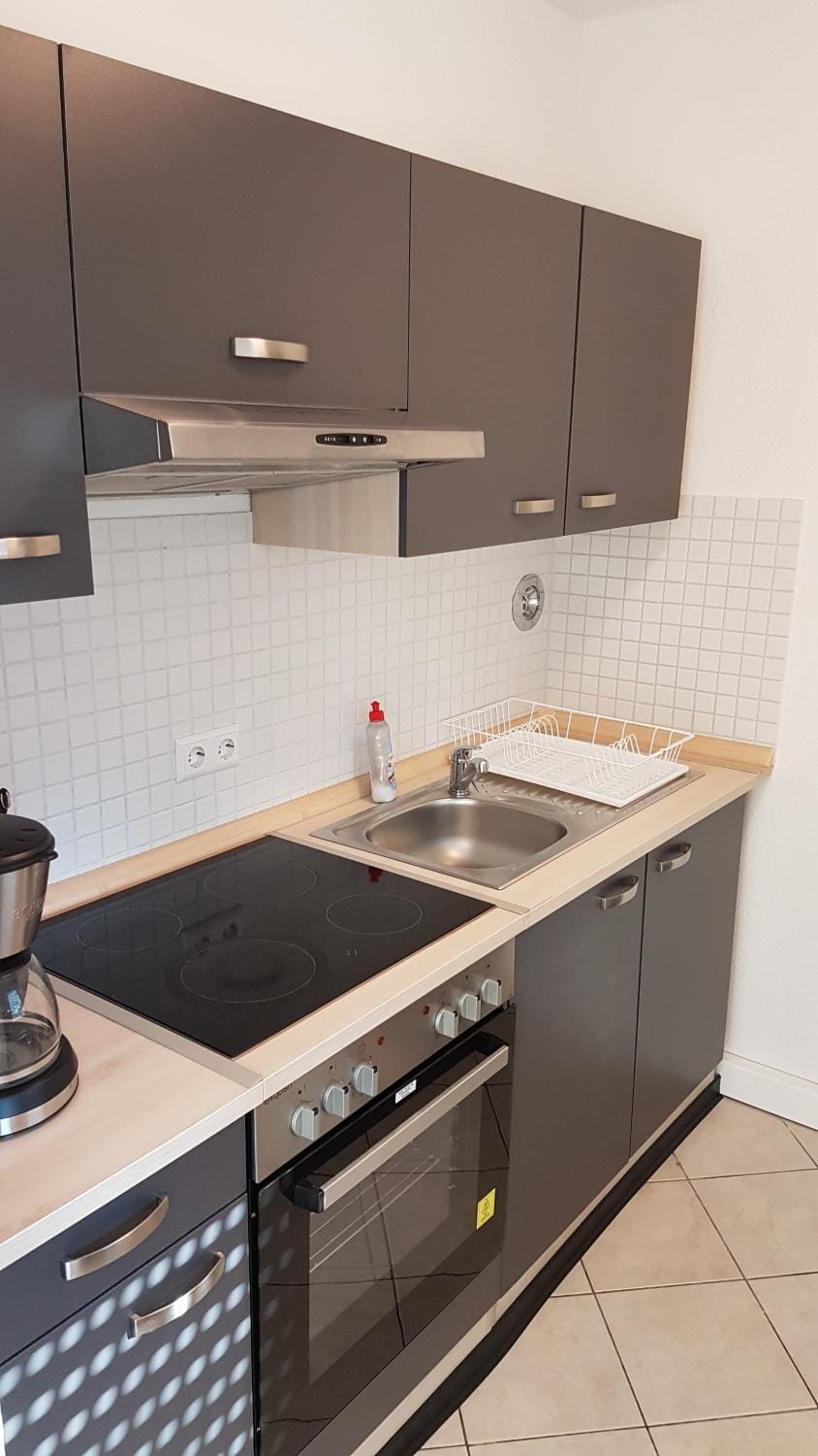 Kitchen or kitchenette, stove, kitchen