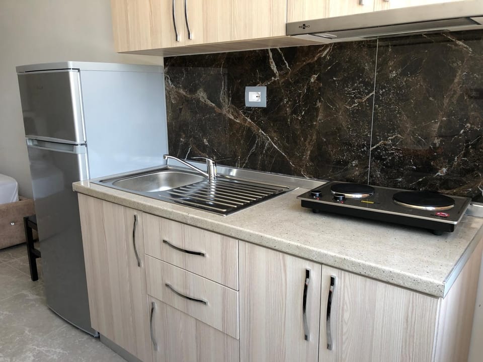 Kitchen or kitchenette, stove
