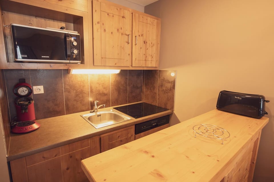 Kitchen or kitchenette, stove