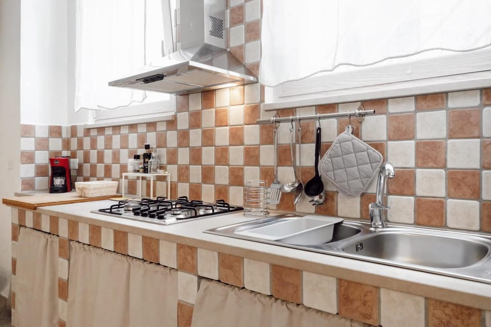 Kitchen or kitchenette, stove