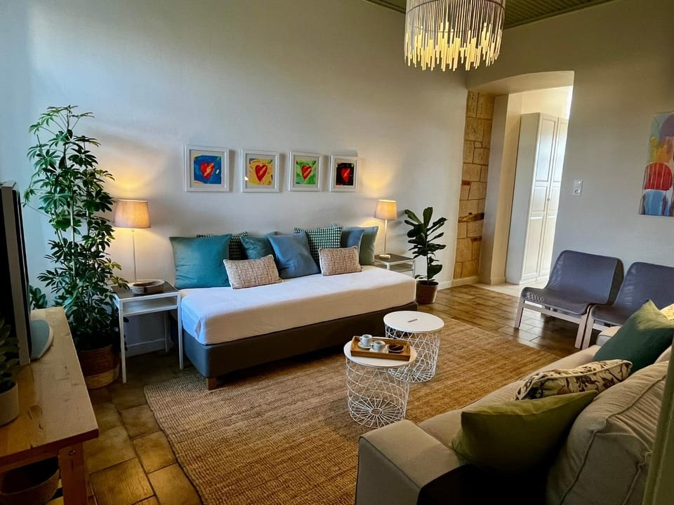 Bed, Living room, Seating area