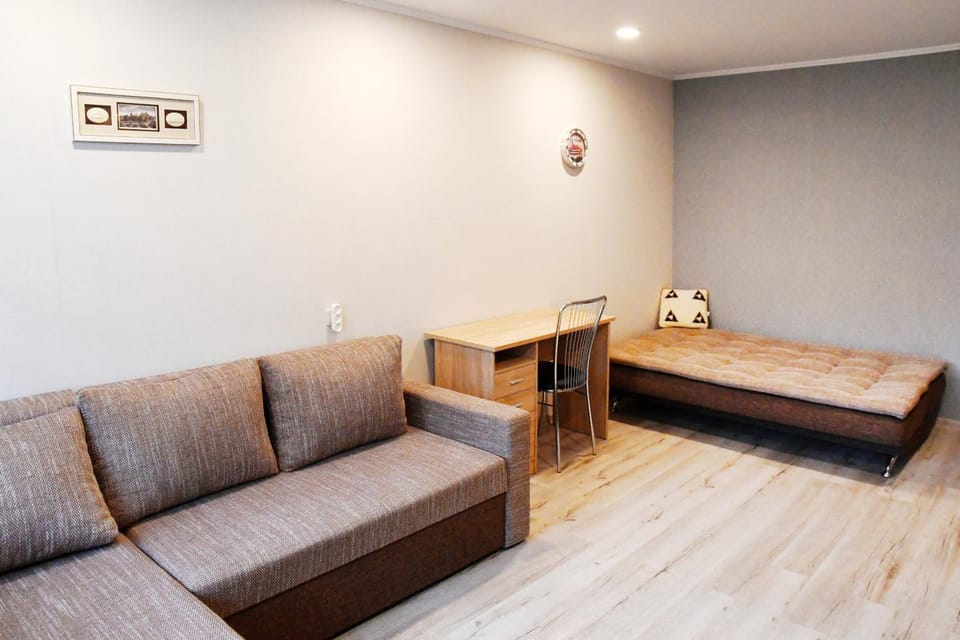 Bed, Living room, Seating area
