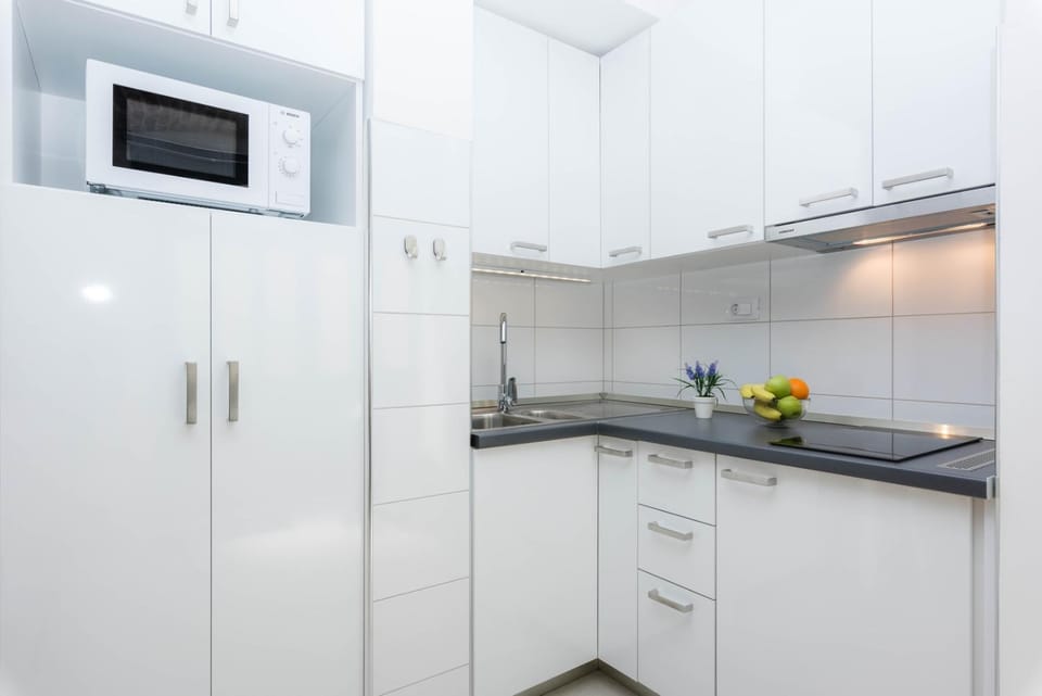 Kitchen or kitchenette, stove