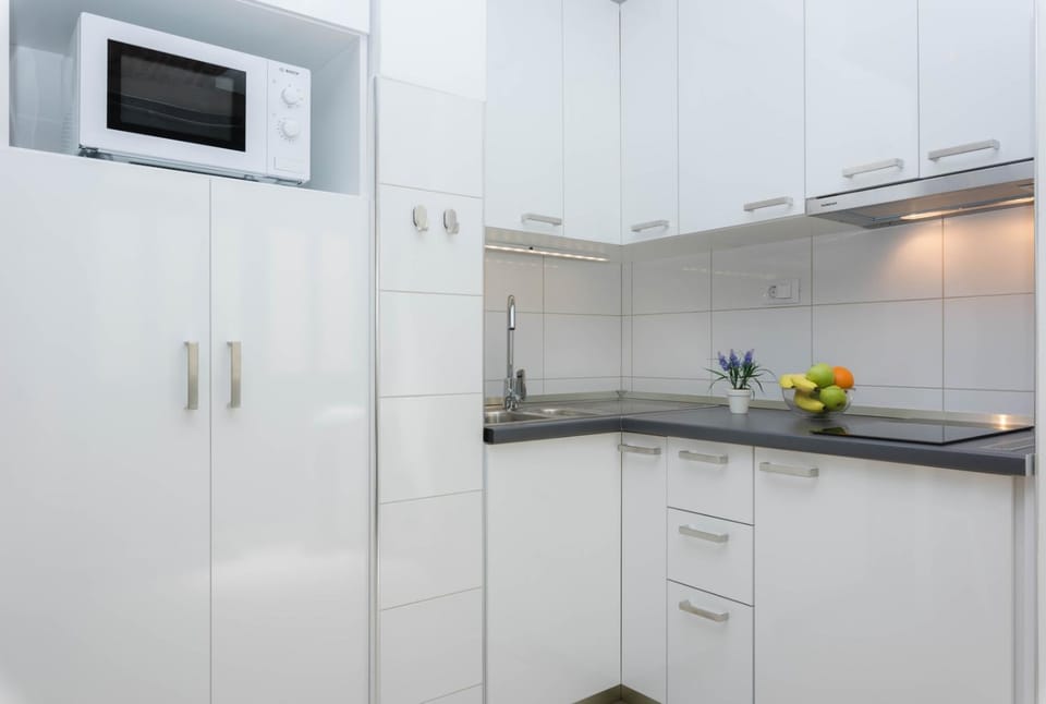 Kitchen or kitchenette, stove