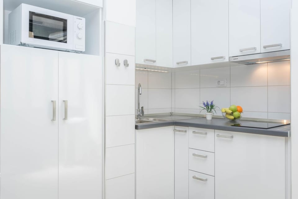 Kitchen or kitchenette, stove