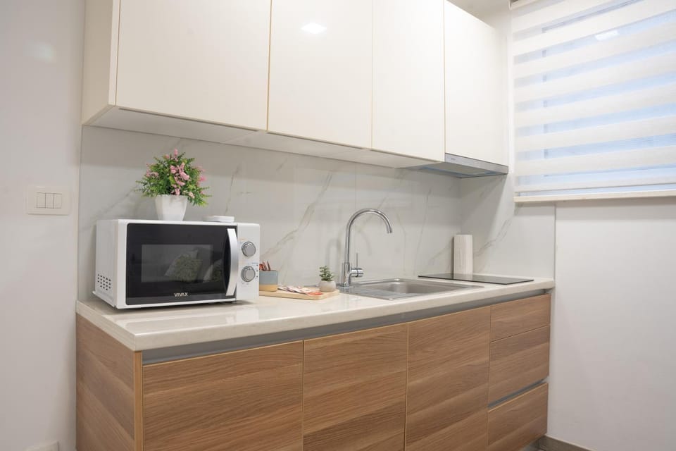 Kitchen or kitchenette, stove