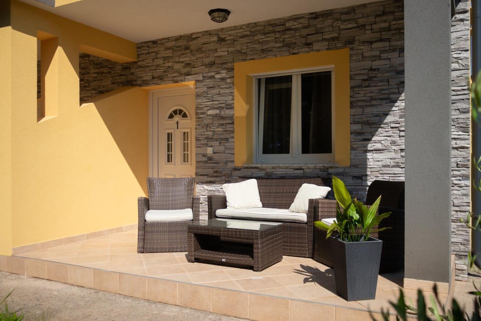 Property building, Patio, Day, Seating area