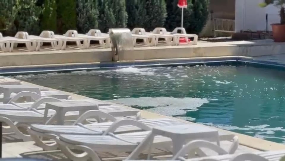 Swimming pool, sunbed
