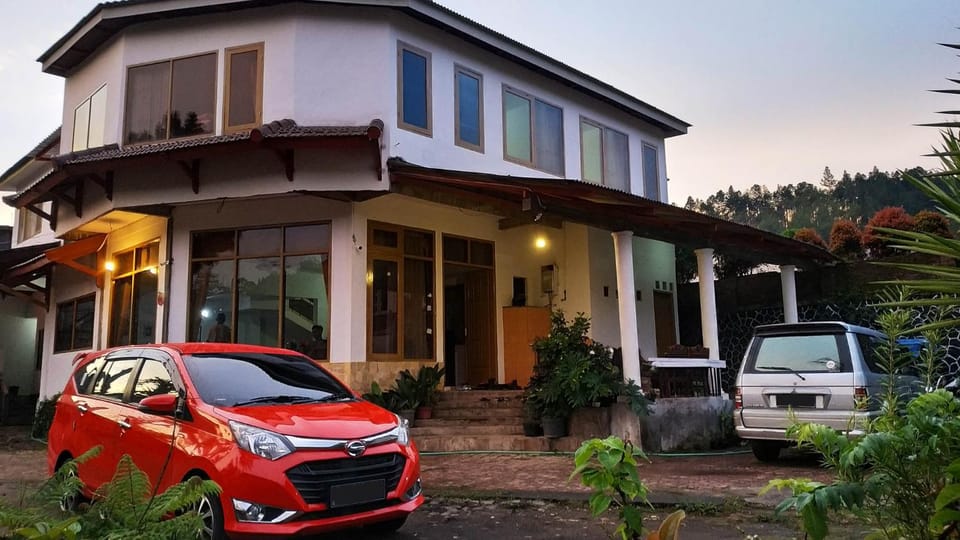 Property building, Facade/entrance, Off site, Natural landscape, On site, Garden view, Sunset, Inner courtyard view