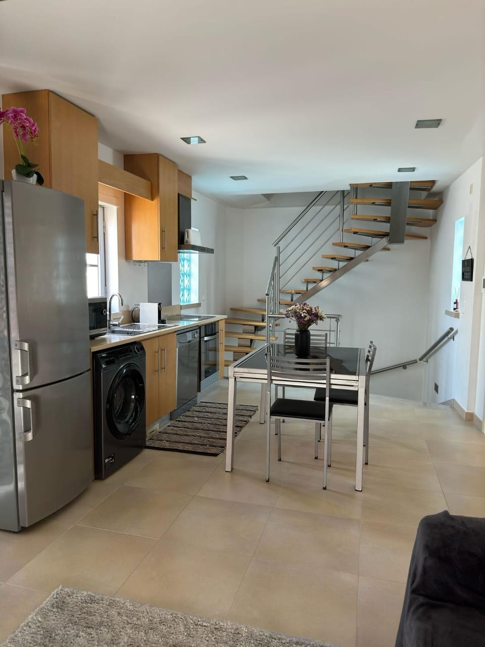 Kitchen or kitchenette, Dining area, dishwasher, oven, stove, washing machine