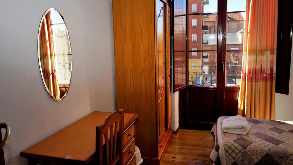 Bed, Seating area, Bedroom