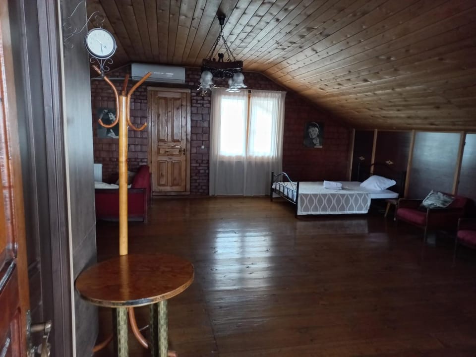 Photo of the whole room, air conditioner