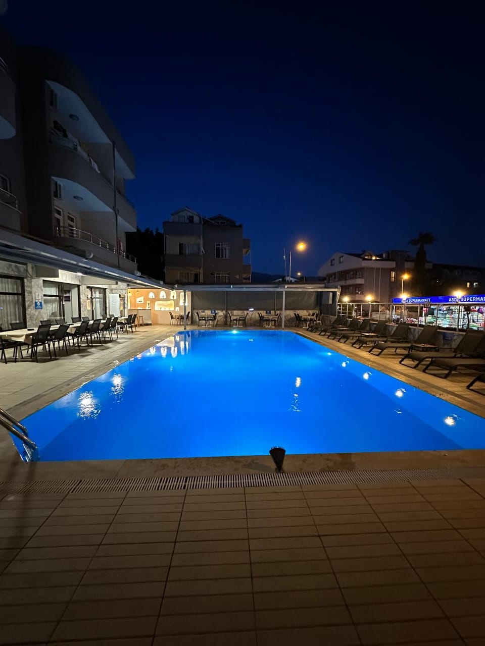 Property building, Night, Pool view, Swimming pool, Swimming pool, sunbed