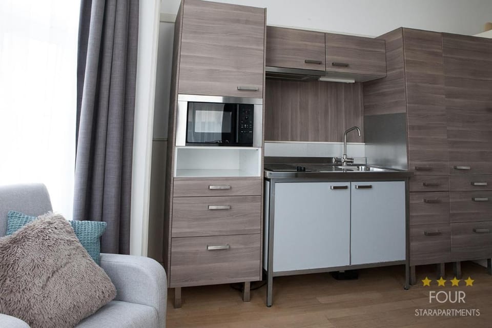 Kitchen or kitchenette, oven, stove