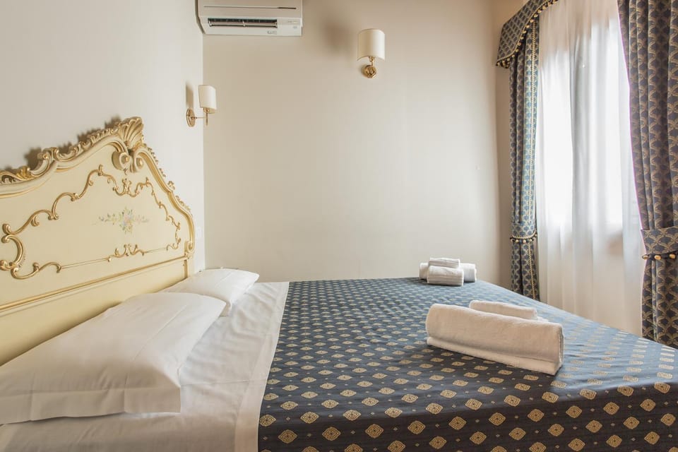 Bed, Photo of the whole room, Bedroom, towels, air conditioner