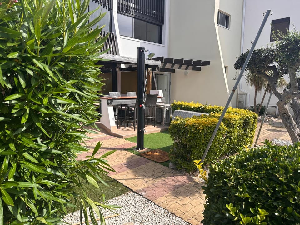 Rez de jardin OU 4e avec ascenseur- VELO - PISCINE -WIFI-Dans le Village naturiste-HOLIDAYSOCHIC Apartment in Agde