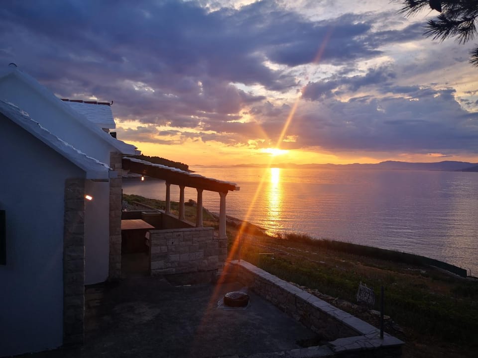 Property building, Natural landscape, Garden, View (from property/room), Balcony/Terrace, Mountain view, Sea view, Sunset