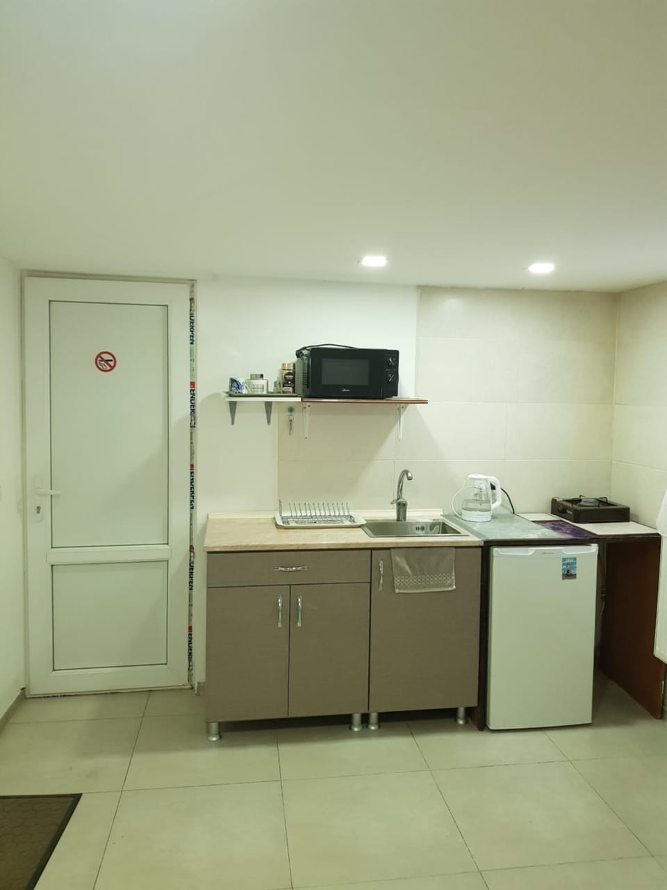 Kitchen or kitchenette, microwave